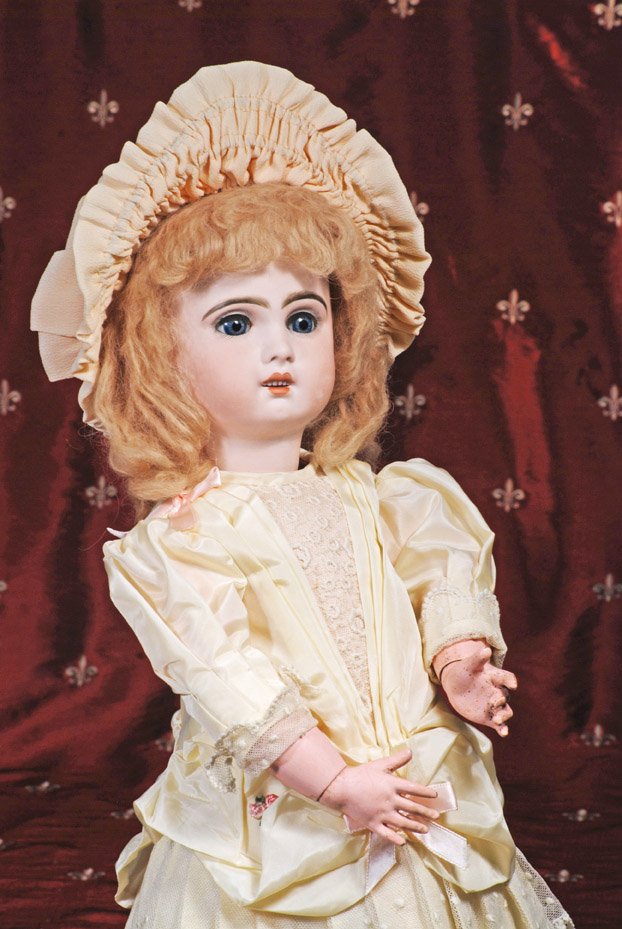 FRENCH BISQUE BEBE BY JUMEAU. Marks: 8. 21”. B: FRENCH BISQUE BEBE BY JUMEAU. Marks: 8. 21”. Bisque socket head, stationary blue glass eyes, painted lashes and applied upper lashes, feathered and brushstroked brows, pierced ears, open mouth, shad