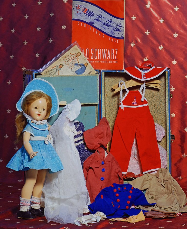 EFFANBEE ANNE SHIRLEY WITH MAGNETIC HANDS, EXCLUSI: EFFANBEE ANNE SHIRLEY WITH MAGNETIC HANDS, EXCLUSIVELY FOR FAO SCHWARZ IN 1940, WITH TRUNK, WARDROBE, ACCESSORIES AND PROVENANCE. Marks: Effanbee Anne Shirley. 21”. Composition socket head on five-p