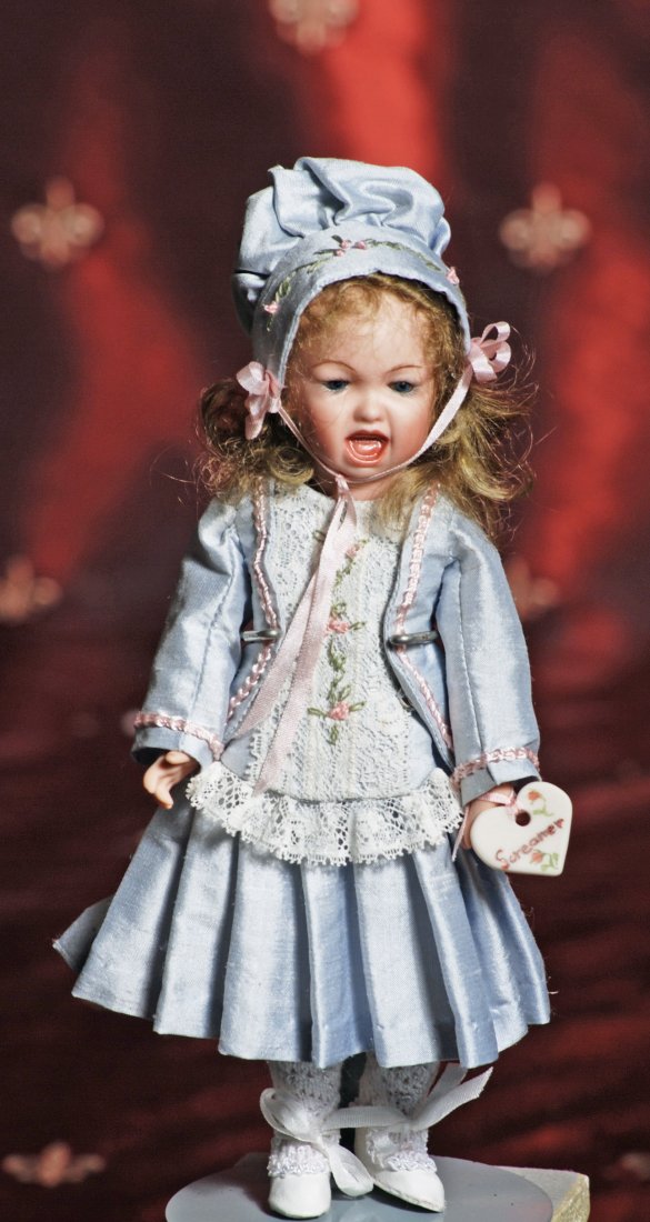 THREE BISQUE ARTIST DOLLS: THREE CONTEMPORARY BISQUE DOLLS: 8” Jumeau character “Screamer” bisque doll on jointed bisque body, artist signed; plus 8” and 9” bisque character babies. Excellent condition.