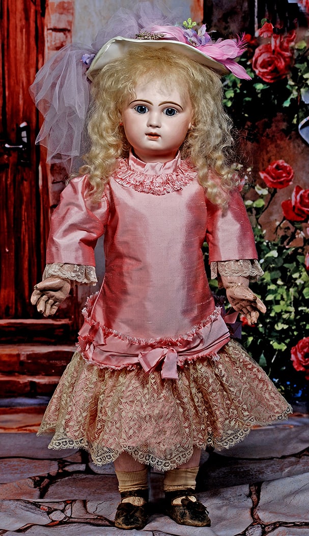 BEAUTIFUL FRENCH BISQUE BEBE BY JUMEAU: BEAUTIFUL FRENCH BISQUE BEBE BY JUMEAU. 26”. Marks: Depose Tete Jumeau Bte. SGDG 12. Bisque socket head, blue paperweight eyes, painted lashes, eyeliner, rose-blushed eye shadow, feathered and b