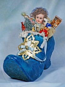 GERMAN BISQUE DOLL IN PAPER MACHE SHOE PRESENTATION