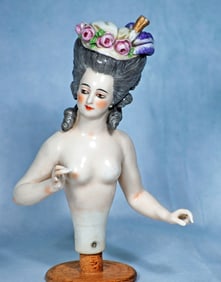 LARGE GERMAN PORCELAIN HALF DOLL BY DRESSEL AND KISTER