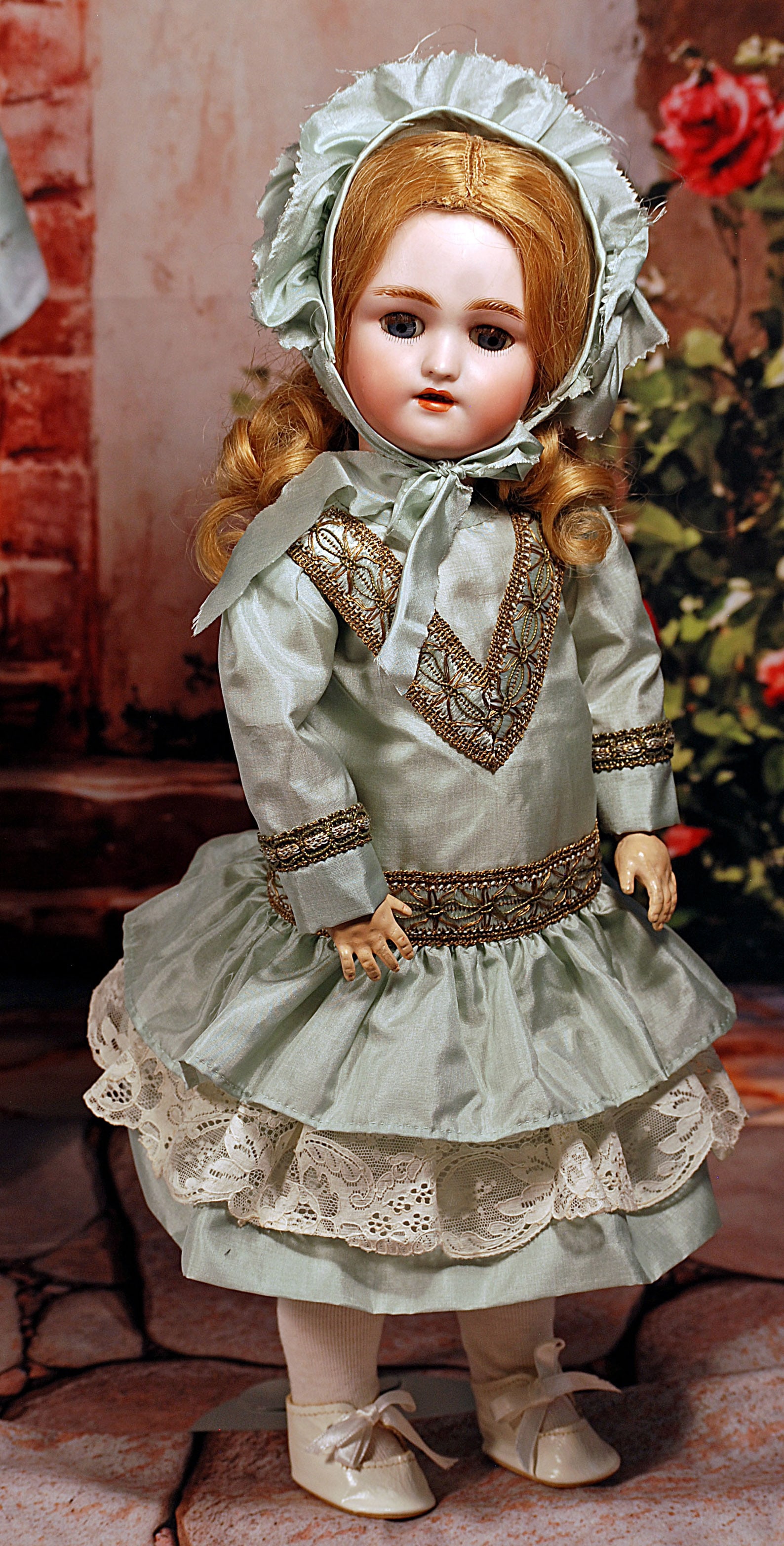 GERMAN BISQUE CHILD BY HANDWERCK: GERMAN BISQUE CHILD BY HANDWERCK. 19”. Marks: Heinrich Handwerck / Simon and Halbig. Bisque socket head, blue sleep eyes, painted lower lashes, applied upper lashes, feathered brows, pierced ear
