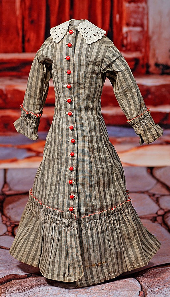 ANTIQUE COTTON STRIPED DAY DRESS FOR LADY DOLLS: ANTIQUE COTTON STRIPED DAY DRESS FOR LADY DOLLS. Cotton day dress of striped brown and tan cotton with princess style and deep gathered flounce, inset long sleeves with gathered cuffs, lace collar, fo