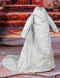 ANTIQUE COTTON MORNING DRESS FOR LADY DOLLS: ANTIQUE COTTON MORNING DRESS FOR LADY DOLLS. White and black dotted cotton one-piece dress, long sleeves, two front pockets, six-button front closing, fitted back seams with extended train, 3 ½&#