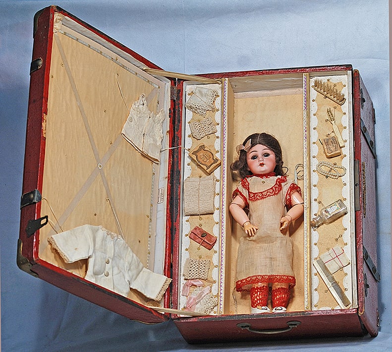 FRENCH BISQUE DOLL IN PRESENTATION TRUNK: FRENCH BISQUE DOLL IN PRESENTATION TRUNK. 12”. Marks: Dep. Bisque socket head, blue sleep eyes, applied upper lashes, painted lower lashes, feathered brows, pierced ears, open mouth, accented li