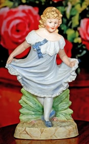 GERMAN ALL-BISQUE FIGURE OF YOUNG GIRL BY GEBRUDER HEUBACH