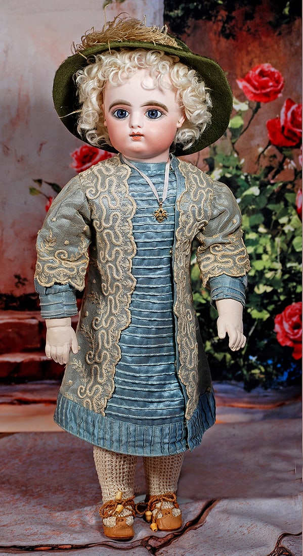 BEAUTIFUL FRENCH BISQUE BEBE BY GAULTHIER WITH GESLAND BODY: BEAUTIFUL FRENCH BISQUE BEBE BY GAULTHIER WITH GESLAND BODY. 21”. Marks: F.G. in scroll 8. Bisque swivel head on composition shoulderplate, large blue paperweight eyes, painted lashes, dark eyel