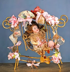 MINIATURE GERMAN BISQUE DOLL IN SWING PRESENTATION
