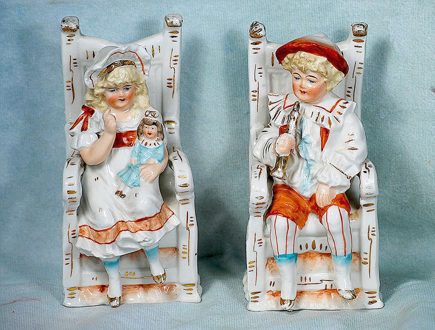 PAIR OF GERMAN PORCELAIN CHILDREN WITH DOLL AND TOYS (1 of 1)