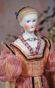 GERMAN BISQUE LADY WITH SCULPTED HAIR AND ELABORATE  DRESEN HAIR ORNAMENTS BY C