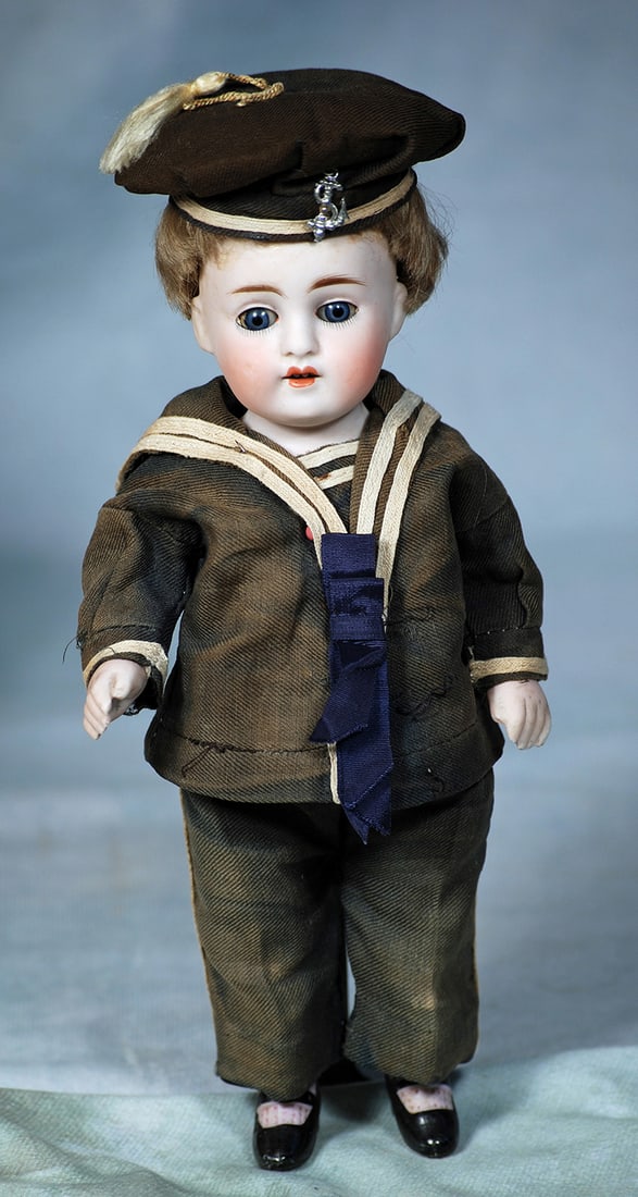 LARGE GERMAN ALL-BISQUE DOLL BY KESTNER: LARGE GERMAN ALL-BISQUE DOLL BY KESTNER. 9”. Marks: 150 – 4. All bisque, jointed shoulders and hips, blue sleep eyes, painted lashes, tapered brows, open mouth, upper teeth, original light