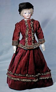 FRENCH BISQUE POUPEE: FRENCH BISQUE POUPEE. Marks: 1. Bisque solid-dome shoulderhead, painted features, blue eyes, upper eyeliner arched brows, closed mouth, blonde lambs wool wig, cloth lady body with replaced leather arm