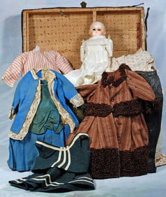 TRUNK WITH DOLL CLOTHING AND PAPER MACHE DOLL.