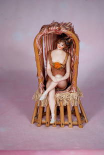 GERMAN BISQUE SEATED BATHING BEAUTY BY GALLUBA AND HOFFMAN: GERMAN BISQUE SEATED BATHING BEAUTY BY GALLUBA AND HOFFMAN. 4 ½” doll. All-bisque nude lady with painted facial features, original mohair wig, white ballet slippers, factory original net