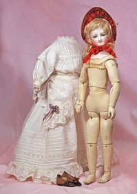 FRENCH BISQUE POUPEE BY BRU WITH DEPOSED WOODEN ARTICULATED BODY