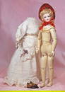 FRENCH BISQUE POUPEE BY BRU WITH DEPOSED WOODEN ARTICULATED BODY