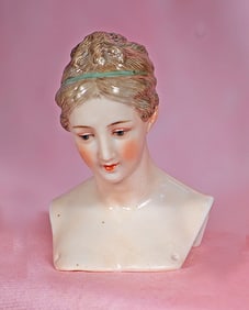 BISQUE DOLL HEAD WITH SCULPTED HAIR BY DRESSEL AND KISTER
