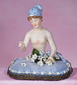 GERMAN PORCELAIN HALF DOLL WITH BLUE BONNET