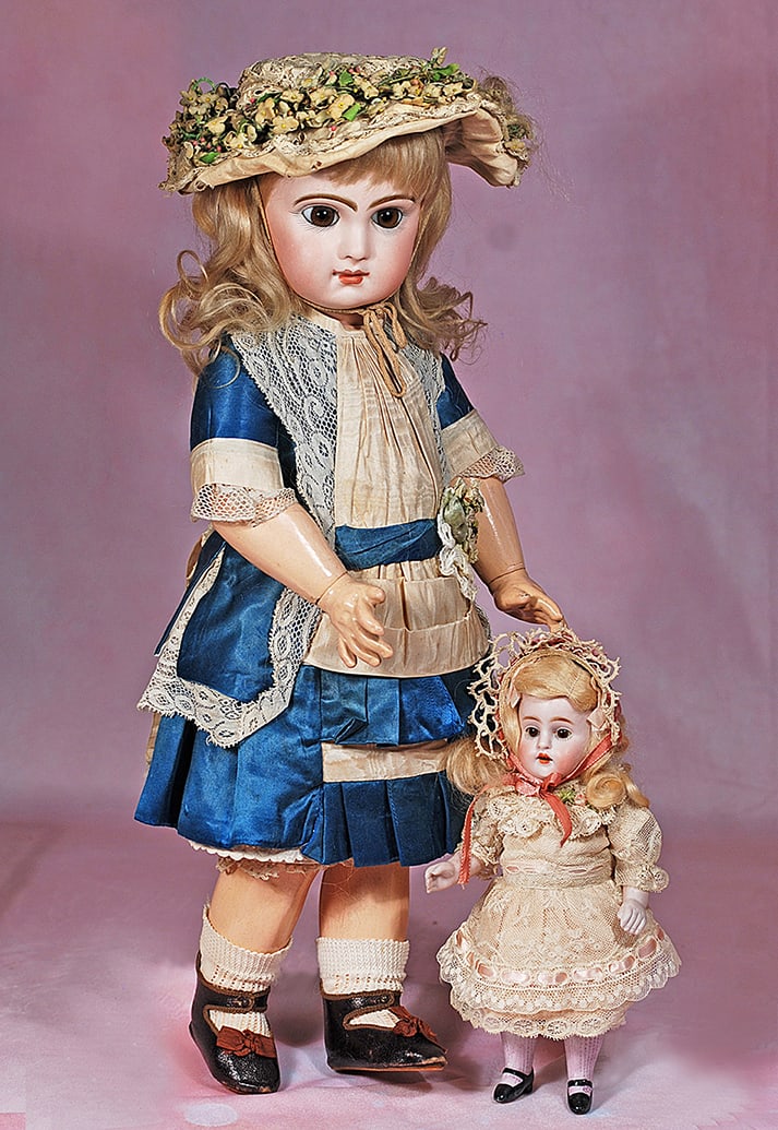 BEAUTIFUL BROWN-EYED FRENCH BISQUE BEBE, SIZE 8, BY EMILE JUMEAU WITH ORIGINAL SHOES: BEAUTIFUL BROWN-EYED FRENCH BISQUE BEBE, SIZE 8, BY EMILE JUMEAU WITH ORIGINAL SHOES. 19”. Marks: Depose Tete Jumeau Bte SGDG 8. Bisque socket head, large brown paperweight eyes, painted lashes,