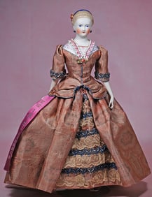 GERMAN BISQUE LADY WITH SCULPTED HAIR ORNAMENTS AND BODICE