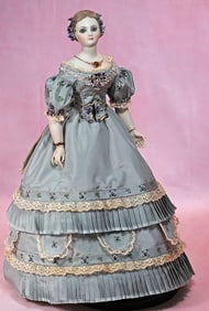 BISQUE PORTRAIT DOLL WITH SCULPTED HAIR AND NECKLACE BY ARTIST BEVERLY WALTER