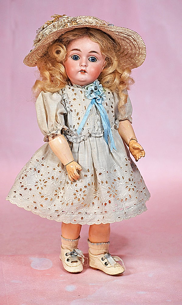 PETITE GERMAN BISQUE CHILD, 155, BY KESTNER: PETITE GERMAN BISQUE CHILD, 155, BY KESTNER. 10 ½”. Marks: B made in Germany 3, 155. Bisque socket head, blue sleep eyes, painted lashes, eyeliner, feathered brows, open mouth, upper teeth,