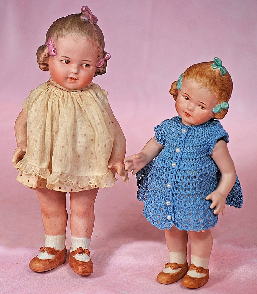 RARE GERMAN ALL-BISQUE ?THREE-BOW? CHARACTER 10490 BY GEBRUDER HEUBACH: RARE GERMAN ALL-BISQUE “THREE-BOW” CHARACTER 10490 BY GEBRUDER HEUBACH. Marks: 10490 3, One-piece bisque head and torso, sculpted brown hair in short ringlet curls captured by a pink sculp