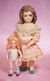 PETITE GERMAN BISQUE CHARACTER DOLL BY MYSTERY MAKER WITH MINIATURE ALL-BISQUE DOLL