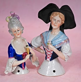 TWO GERMAN PORCELAIN HALF DOLLS BY GOEBEL