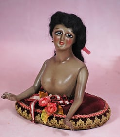GERMAN BISQUE BROWN-COMPLEXIONED HALF DOLL WITH JOINTED ARMS