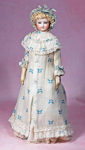LOVELY FRENCH BISQUE POUPEE ATTRIBUTED TO BARROIS: LOVELY FRENCH BISQUE POUPEE ATTRIBUTED TO BARROIS. 17”. Marks: 3. Bisque swivel head on bisque shoulderplate, blue glass paperweight eyes, painted lashes, dark eyeliner, multi-stroked and arched