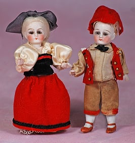 TWO MINIATURE ALL-BISQUE DOLLS