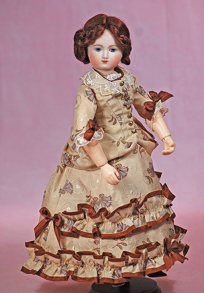 BISQUE HURET POUPEE, ARTIST REPRODUCTION: BISQUE HURET POUPEE, ARTIST REPRODUCTION. 12 ½”. Marks: Huret, artist signature, 2011. Bisque swivel head on bisque shoulderplate, painted features, mohair wig, jointed poupee Huret style b