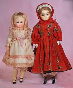 TWO GERMAN PAPER MACHE DOLLS