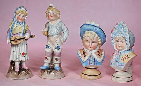 PAIR OF GERMAN PORCELAIN FIGURES AND PAIR OF GERMAN BISQUE BUSTS