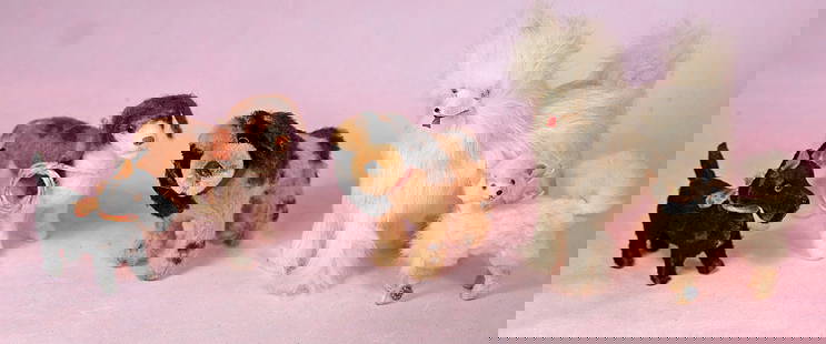 FIVE MINIATURE AND SMALL PUPS: FIVE MINIATURE AND SMALL PUPS. 3&#8221; to 5 &#189;&#8221;. White push and mohair pups with glass eyes. Commentary: Good condition.
