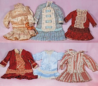 SIX DOLL DRESSES