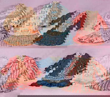 SIX DOLL DRESSES: SIX DOLL DRESSES. 7 &#189;&#8221; to 10&#8221; lengths. Dress of cotton and silk in various sizes and colors; four contemporary maker and two vintage. Commentary: One with wear to silk, others good co