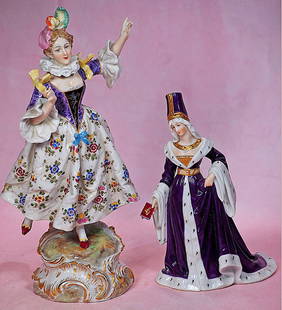 TWO GERMAN PORCELAIN FIGURINES BY DRESSEL AND KISTER: TWO GERMAN PORCELAIN FIGURINES BY DRESSEL AND KISTER. Marks: Blue bishop staff. 11&#8221; Eighteenth century lady with sculpted brown hair adorned with plumes, elaborate costume, red shoes, ornate sel