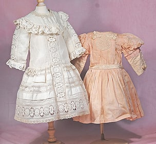 TWO DOLL DRESSES