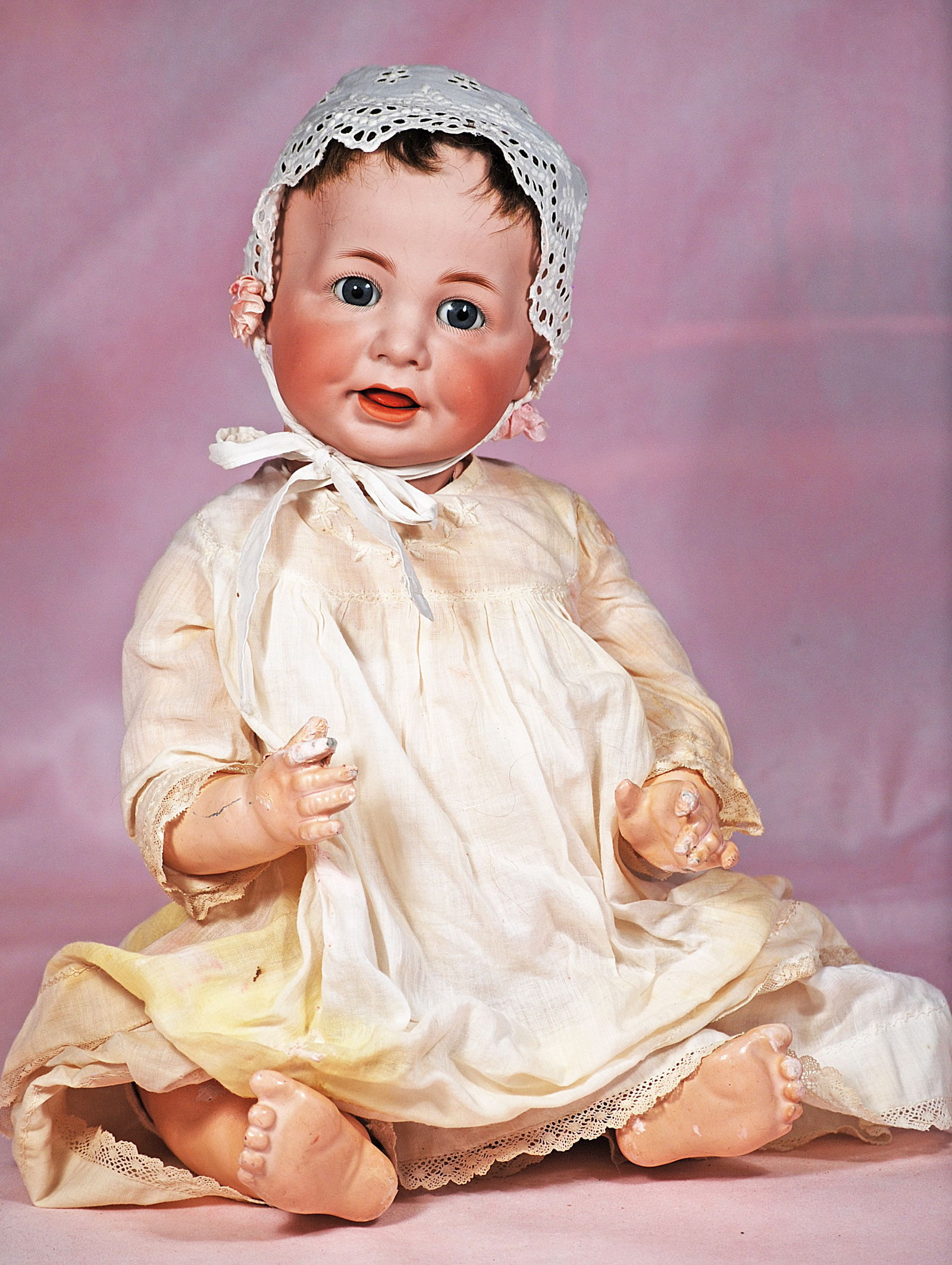 GERMAN BISQUE CHARACTER, 116, BY KAMMER AND REINHARDT: 28. GERMAN BISQUE CHARACTER, 116, BY KAMMER AND REINHARDT. 20”. Marks: 116 K * R. Bisque socket head, blue sleep eyes, painted lashes, feathered brows, open mouth, upper teeth and tongue, dimple