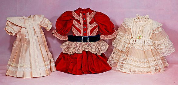 THREE DOLL DRESSES