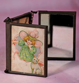 GERMAN MINIATURE TRIPTYCH MIRROR WITH LITHOGRAPHED PANELS.
