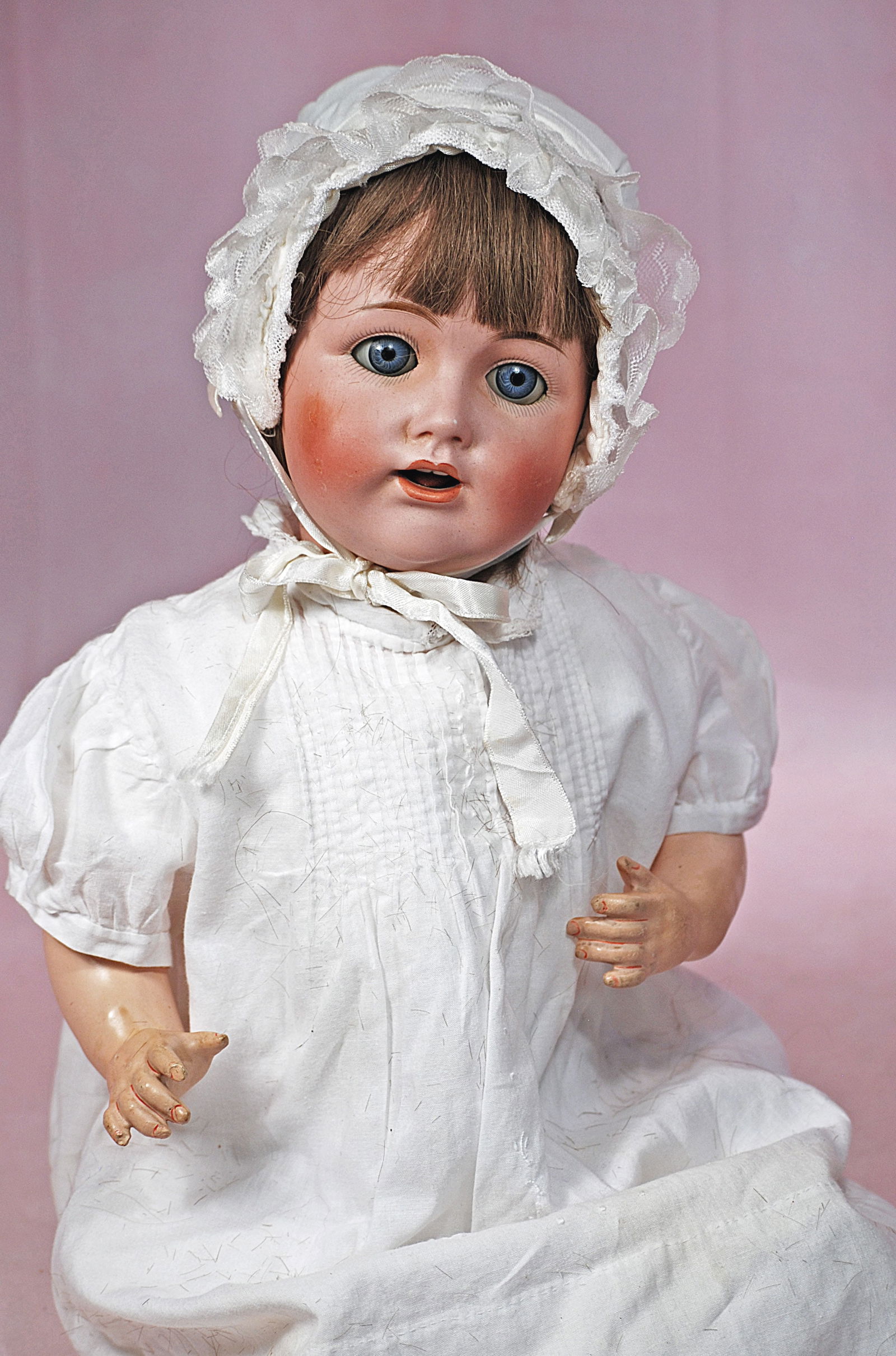GERMAN BISQUE JDK 257 CHARACTER BABY BY KESTNER: 64. GERMAN BISQUE JDK 257 CHARACTER BABY BY KESTNER. 20”. Marks: Made in Germany JDK 257. Bisque socket head, blue sleep eyes, painted lashes, feathered brows, open mouth, accented lips, tongue,