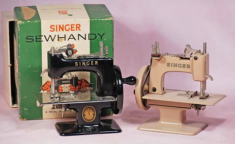 TWO VINTAGE SINGER SEWING MACHINES