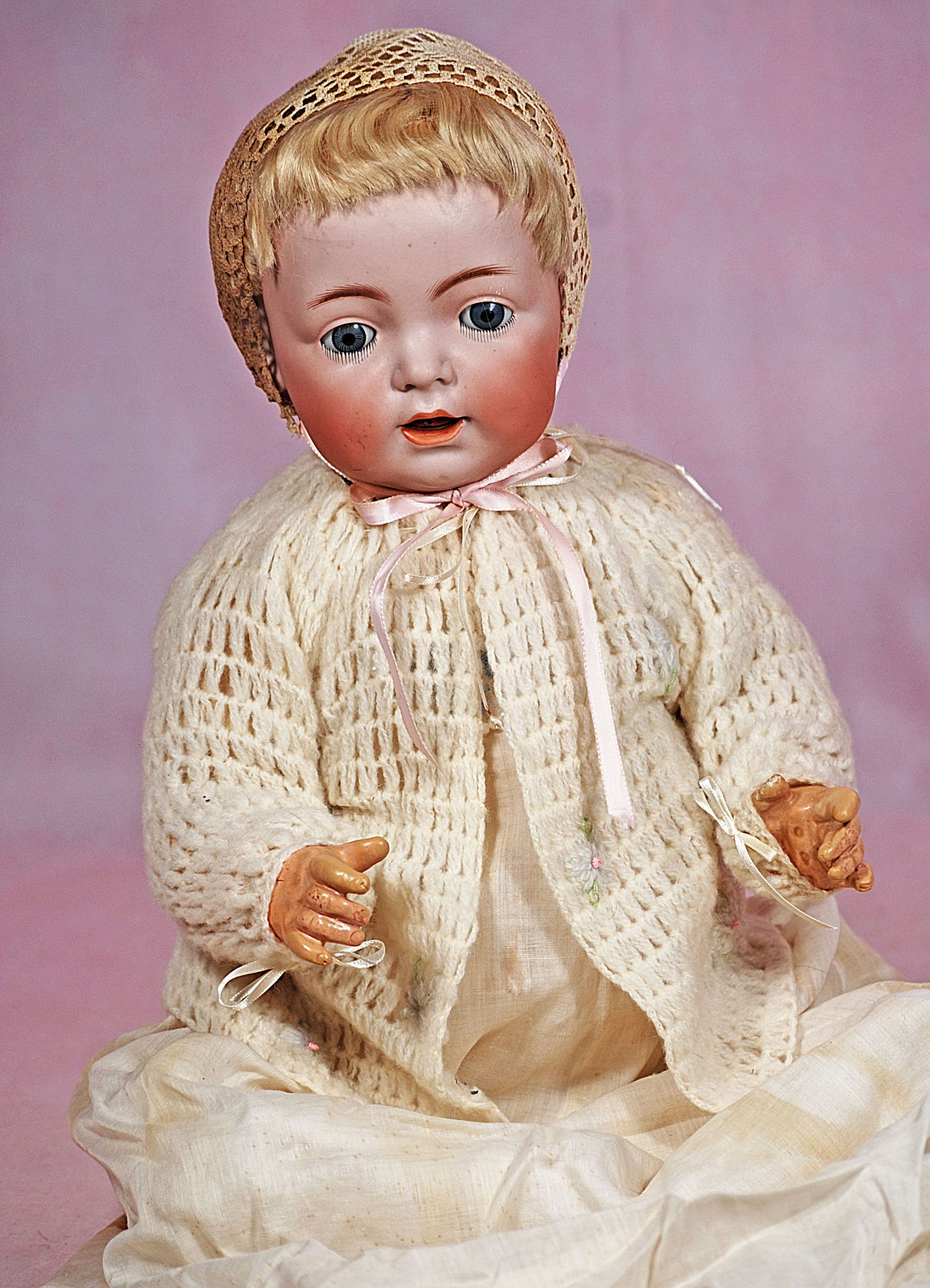 GERMAN BISQUE CHARACTER BABY BY KAMMER AND REINHARDT.: 80. GERMAN BISQUE CHARACTER BABY BY KAMMER AND REINHARDT. 20”. Marks: Simon & Halbig K * R 122. Bisque socket head, blue sleep eyes, painted lashes, feathered brows, open mouth, accented lips, t