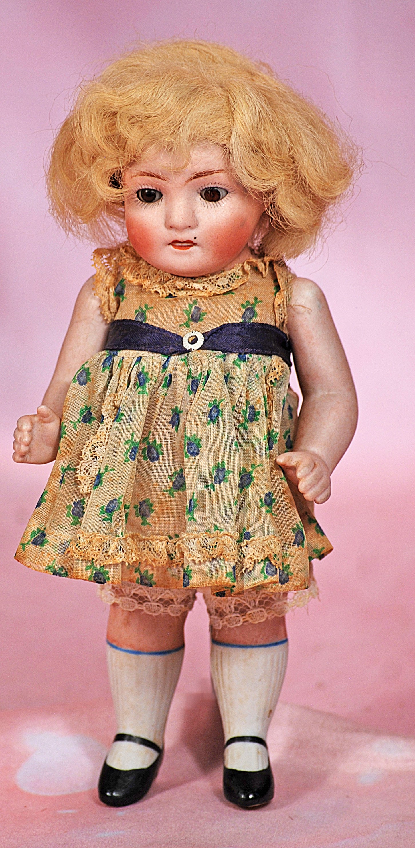 GERMAN ALL-BISQUE DOLL BY KESTNER.: 82. GERMAN ALL-BISQUE DOLL BY KESTNER. 7 ½”. Marks: 83/ 150. All-bisque, jointed at shoulders, stationary brown glass eyes, painted lashes, feathered brows, open/closed mouth with sculpte