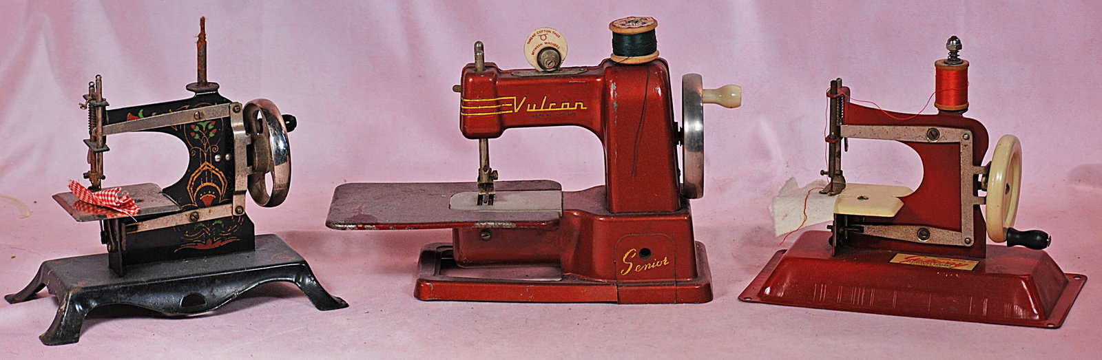 THREE TOY SEWING MACHINES. (1 of 1)