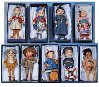 MATCHED SET OF NINE R. JOHN WRIGHT BROWIES, MINT-IN-BOX.